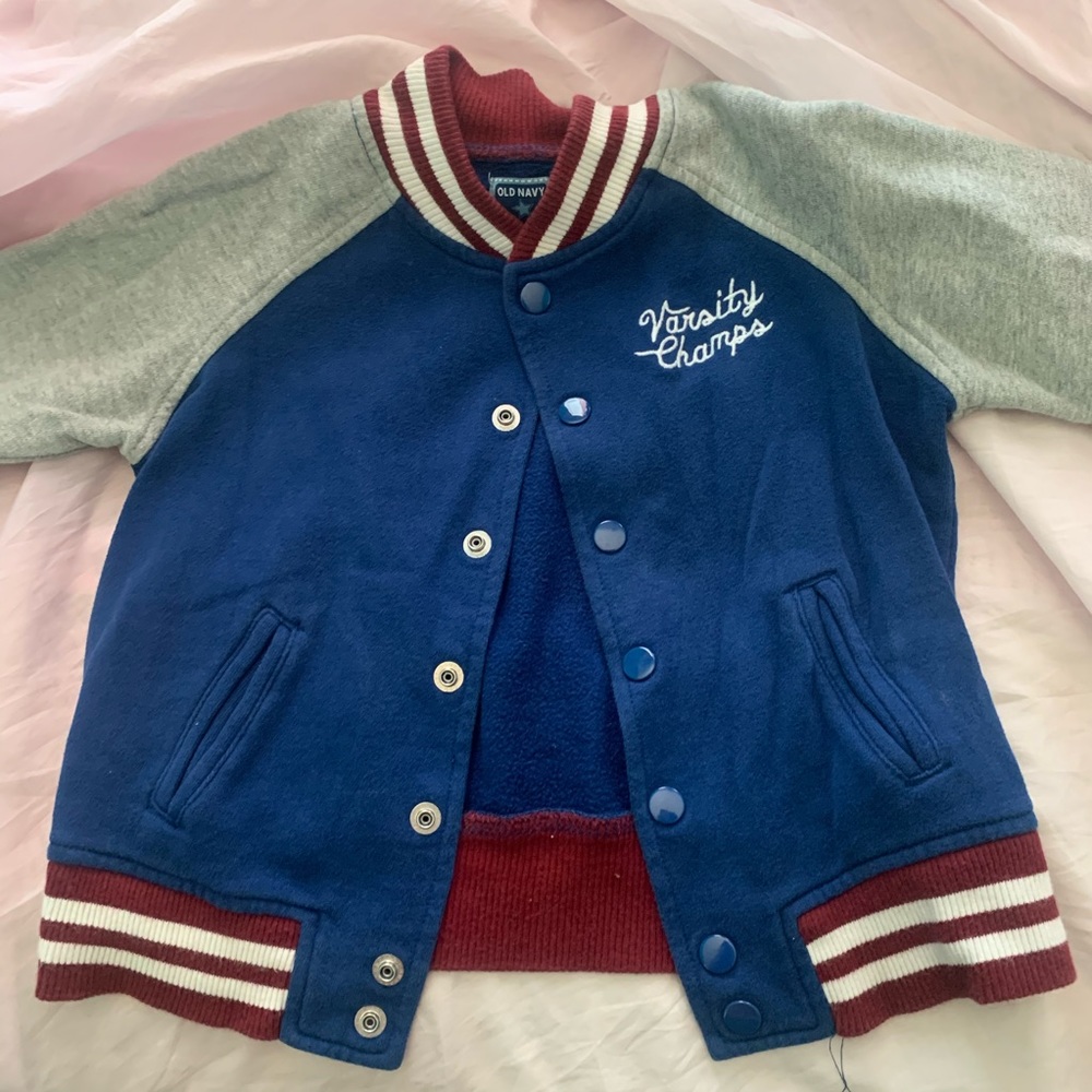 old navy blue and grey little boy’s varsity jacket